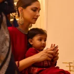 Deepika Padukone with her daughter Dua during a Diwali puja at their home. Image via Instagram (@deepikapadukone).